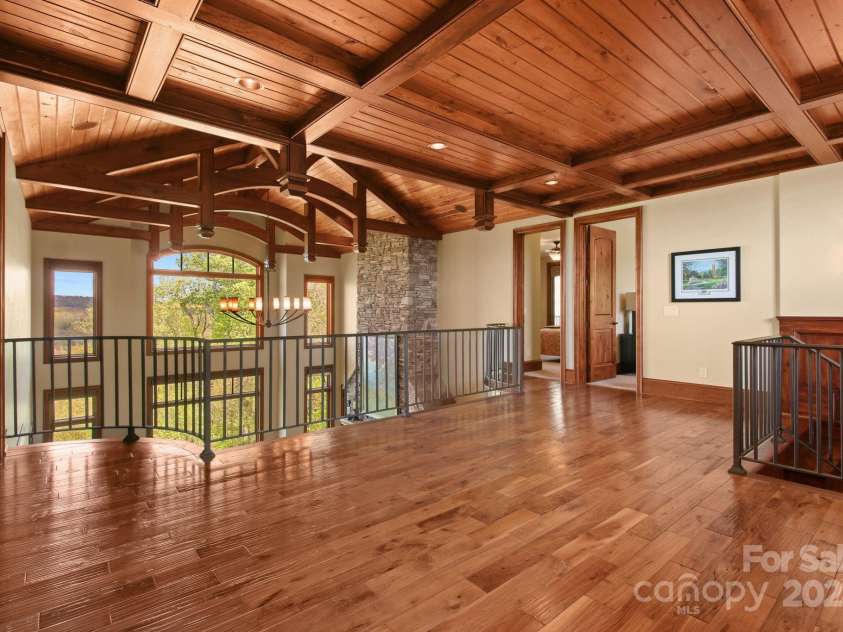 693 Thunderhill Trail, Blowing Rock, NC 28605.  MLS# CAR4253716, YatesRealty ID 13972. Upper-level landing/loft area