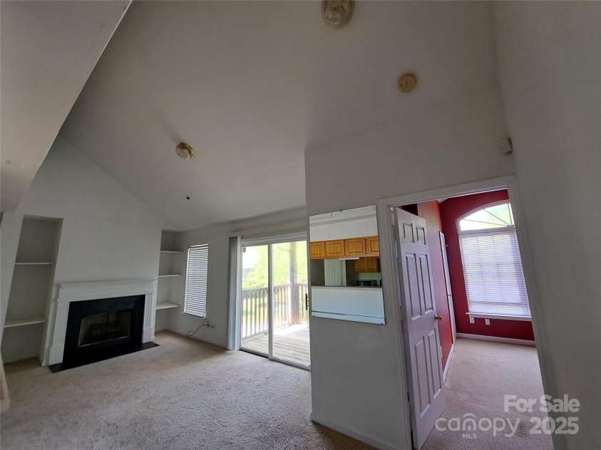 2527 Carya Pond Lane, Charlotte, NC 28212.  MLS# CAR4246596, YatesRealty ID 13974. Den - lots sunlight