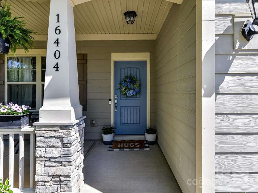 16404 Mckee Ridge Drive, Charlotte, NC 28278.  MLS# CAR4224178, YatesRealty ID 13977. Fiber Cement Siding & Custom Painted Front Door
