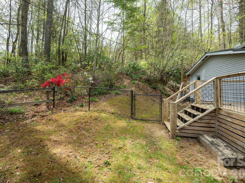 37 Camden Way, Rosman, NC 28772.  MLS# CAR4366138, YatesRealty ID 13983. Backyard