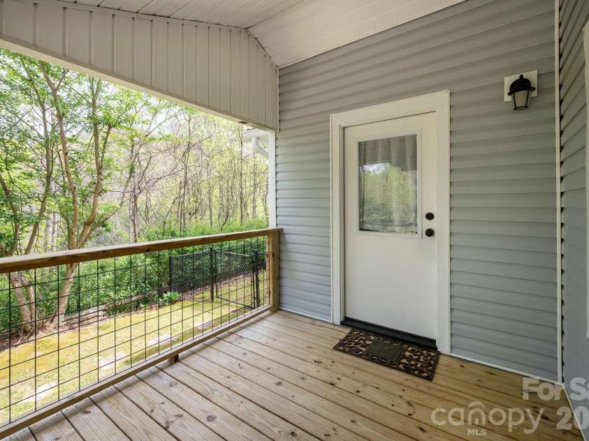 37 Camden Way, Rosman, NC 28772.  MLS# CAR4366138, YatesRealty ID 13983. Front Porch