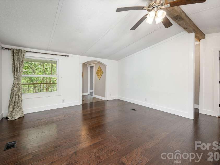37 Camden Way, Rosman, NC 28772.  MLS# CAR4366138, YatesRealty ID 13983. Living Room
