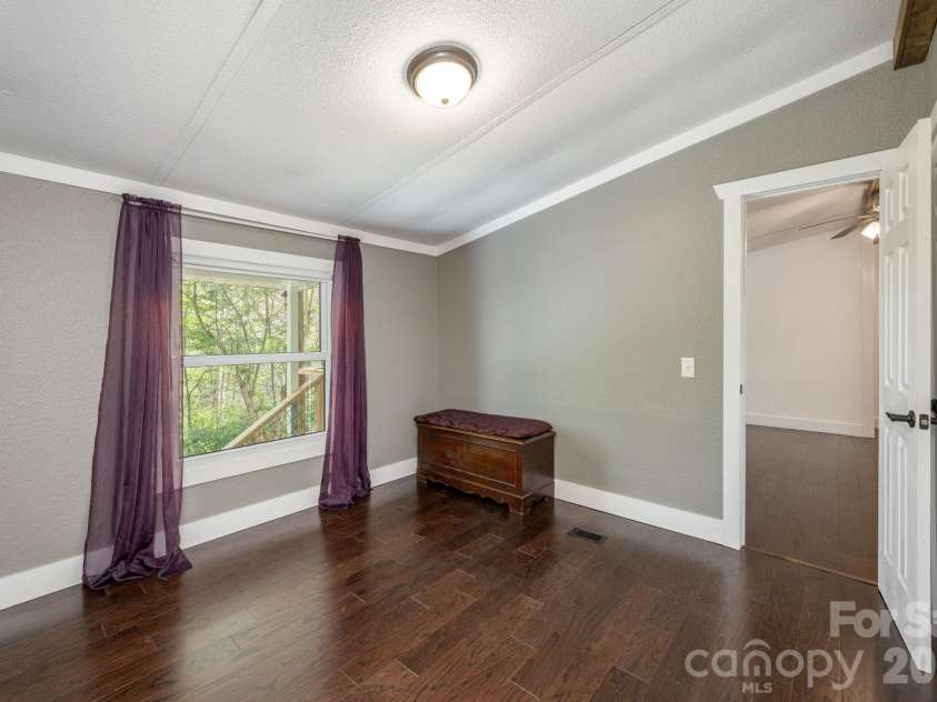 37 Camden Way, Rosman, NC 28772.  MLS# CAR4366138, YatesRealty ID 13983. Primary Bedroom