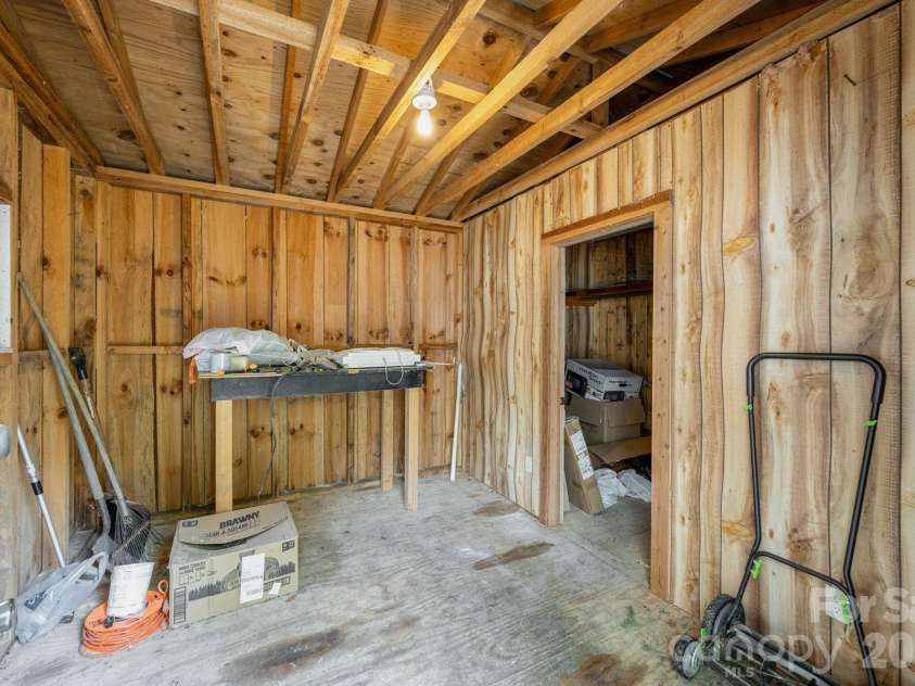 37 Camden Way, Rosman, NC 28772.  MLS# CAR4366138, YatesRealty ID 13983. Spacious shed with power