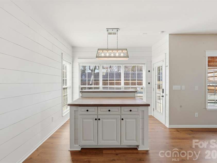 6004 Brook Valley Run, Monroe, NC 28110.  MLS# CAR4344182, YatesRealty ID 13984. Breakfast area- custom lighting/great natural lighting!