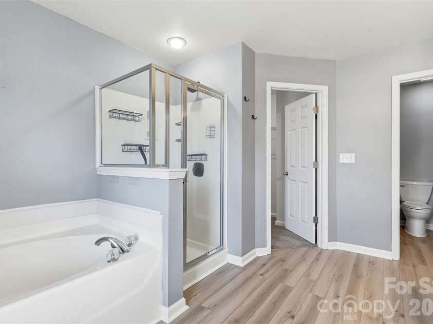 6004 Brook Valley Run, Monroe, NC 28110.  MLS# CAR4344182, YatesRealty ID 13984. Ensuite bath w/ spacious WIC