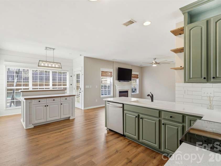 6004 Brook Valley Run, Monroe, NC 28110.  MLS# CAR4344182, YatesRealty ID 13984. Kitchen- custom quartz countertops, custom lighting & shiplap accents, & thoughtfully painted cabinets