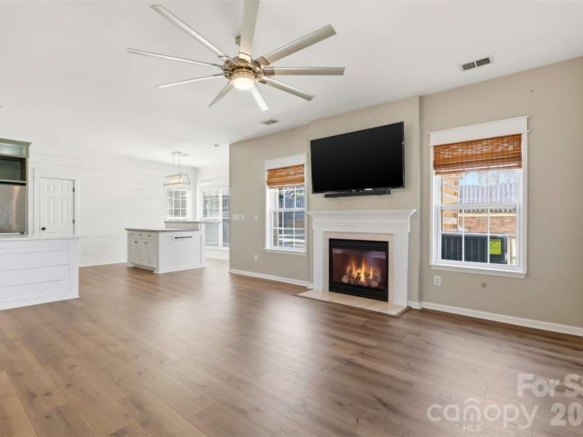 6004 Brook Valley Run, Monroe, NC 28110.  MLS# CAR4344182, YatesRealty ID 13984. Living room w/ gas fireplace