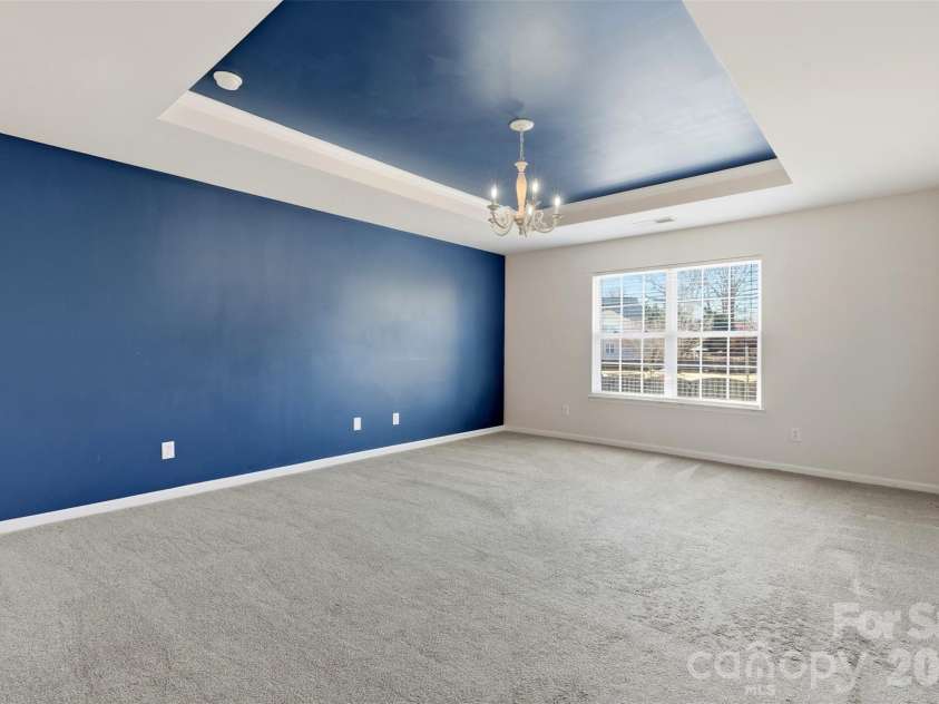 6004 Brook Valley Run, Monroe, NC 28110.  MLS# CAR4344182, YatesRealty ID 13984. Primary bedroom- tray ceiling, ensuite bath, spacious WIC