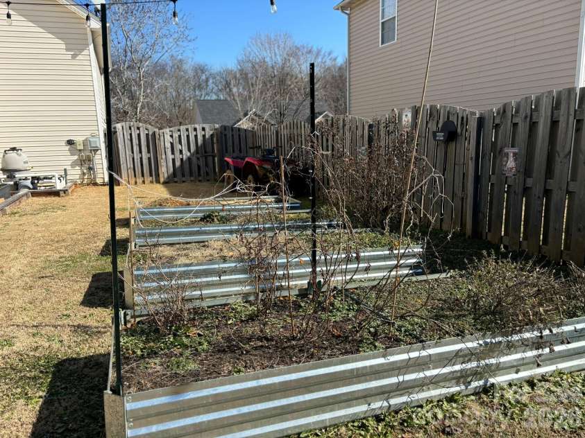 6004 Brook Valley Run, Monroe, NC 28110.  MLS# CAR4344182, YatesRealty ID 13984. Raised garden beds