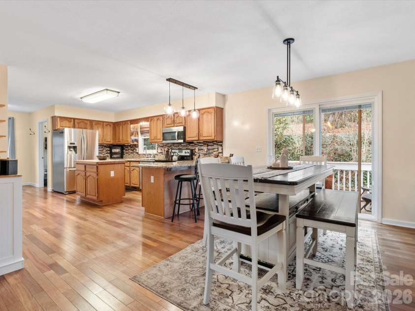 26 Morrow Drive, Fairview, NC 28730.  MLS# CAR4349703, YatesRealty ID 13987. A spacious and open kitchen and dining area