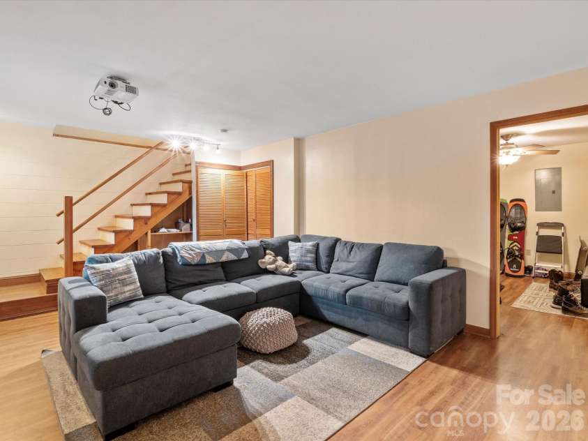 26 Morrow Drive, Fairview, NC 28730.  MLS# CAR4349703, YatesRealty ID 13987. Downstairs den