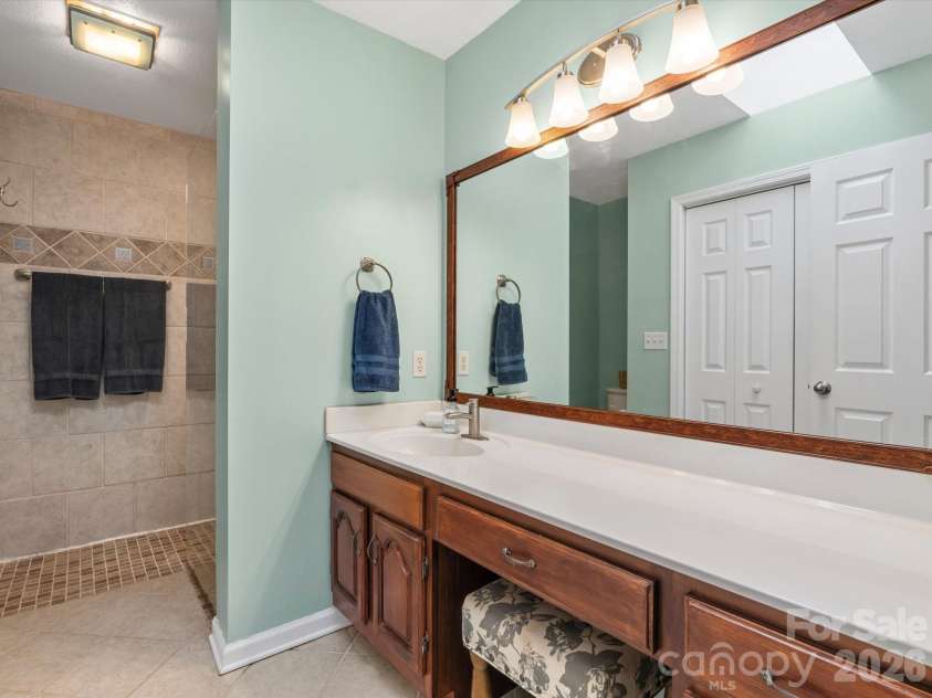 26 Morrow Drive, Fairview, NC 28730.  MLS# CAR4349703, YatesRealty ID 13987. Large ensuite bathroom