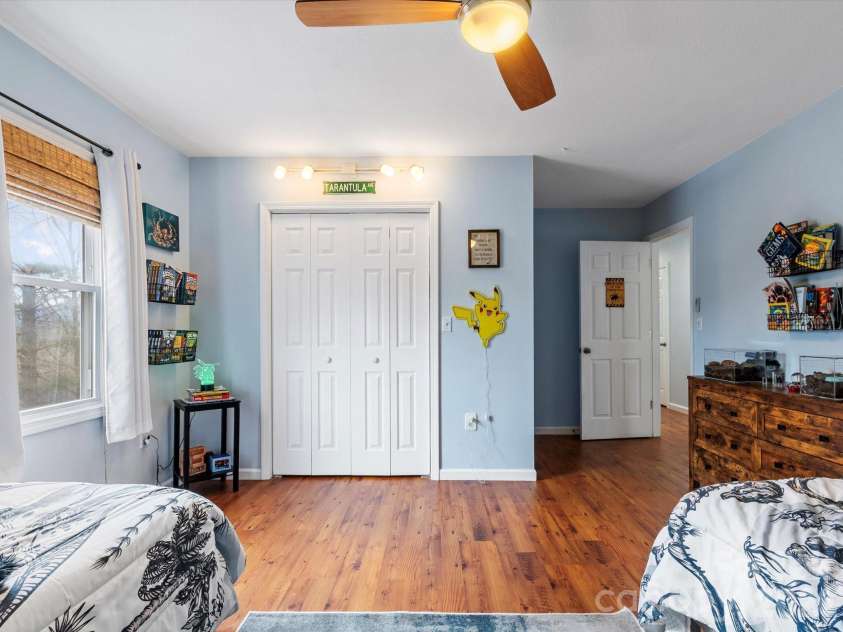 26 Morrow Drive, Fairview, NC 28730.  MLS# CAR4349703, YatesRealty ID 13987. Second upstairs bedroom with ample closet space