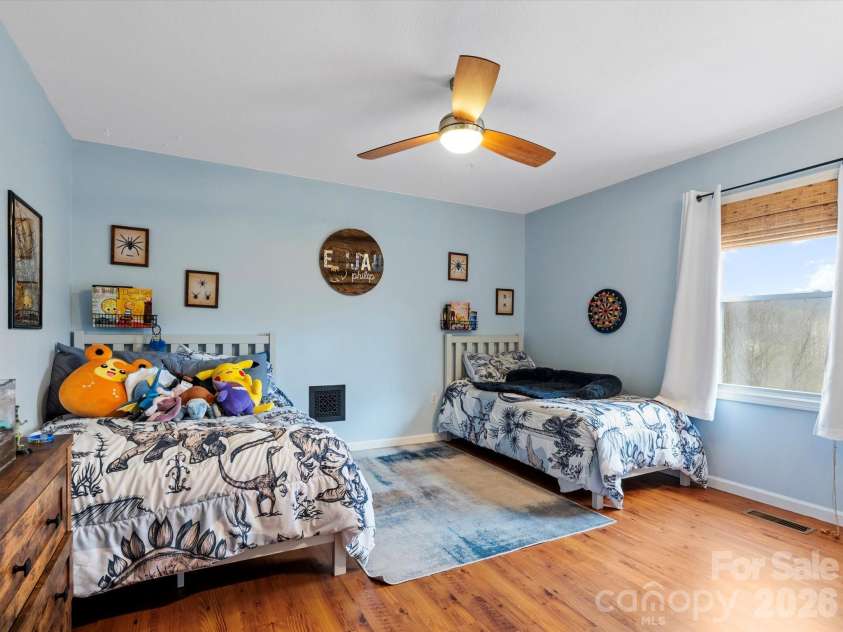 26 Morrow Drive, Fairview, NC 28730.  MLS# CAR4349703, YatesRealty ID 13987. Second upstairs bedroom - with mountain views!