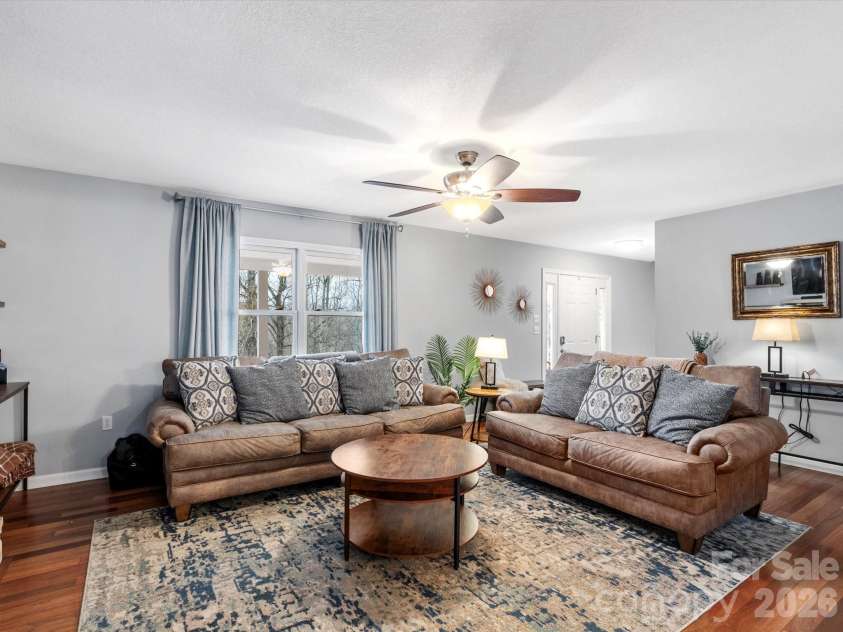 26 Morrow Drive, Fairview, NC 28730.  MLS# CAR4349703, YatesRealty ID 13987. The front entry opens into a bright living room