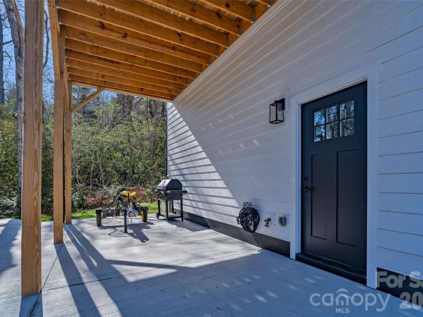 26 Pineview Road, Fairview, NC 28730.  MLS# CAR4357882, YatesRealty ID 13989. Basement entrance