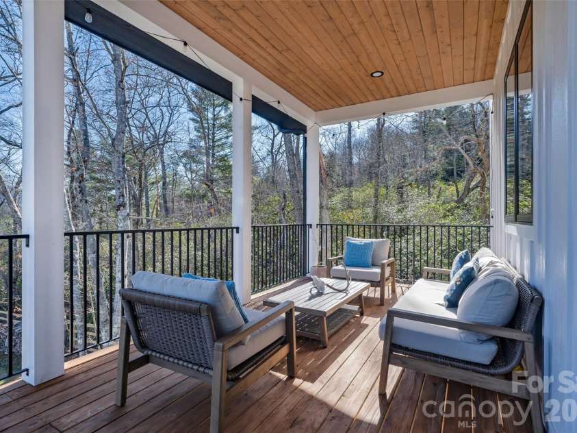 26 Pineview Road, Fairview, NC 28730.  MLS# CAR4357882, YatesRealty ID 13989. Covered back deck