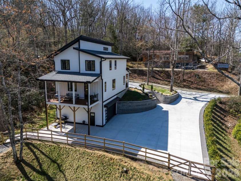 26 Pineview Road, Fairview, NC 28730.  MLS# CAR4357882, YatesRealty ID 13989. Side house/parking