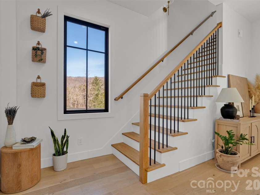 26 Pineview Road, Fairview, NC 28730.  MLS# CAR4357882, YatesRealty ID 13989. Stairway