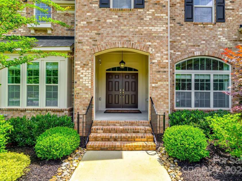 801 Hidden Pond Lane, Waxhaw, NC 28173.  MLS# CAR4253726, YatesRealty ID 13993. Estate Entry with Double Doors.