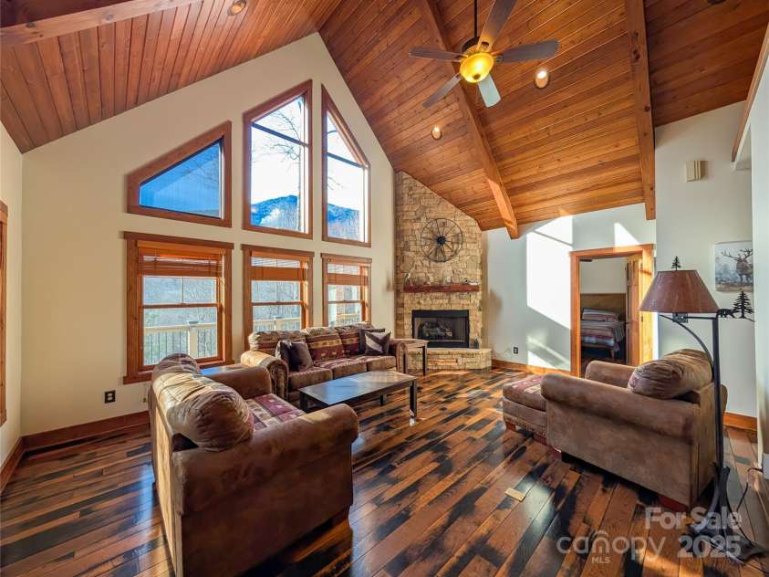 13 Miners Trace Road, Burnsville, NC 28714.  MLS# CAR4206928, YatesRealty ID 13994. Additional view of Great Room from dining area.