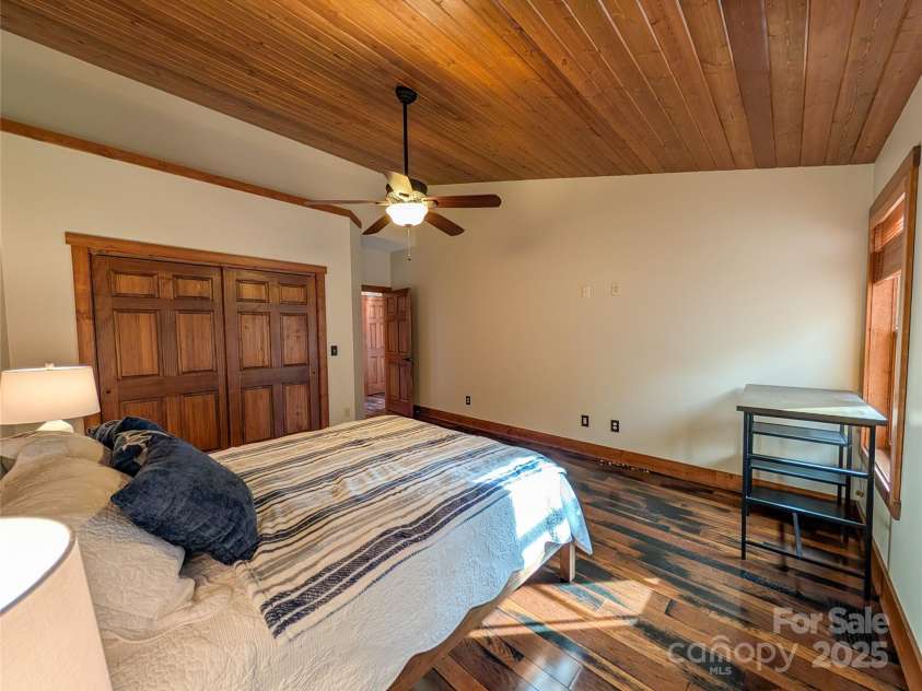 13 Miners Trace Road, Burnsville, NC 28714.  MLS# CAR4206928, YatesRealty ID 13994. Additional view of second bedroom showing double closet.