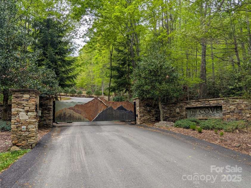 13 Miners Trace Road, Burnsville, NC 28714.  MLS# CAR4206928, YatesRealty ID 13994. Beautiful custom gate greats you as you arrive at entrance to The Cove at Celo Mountain