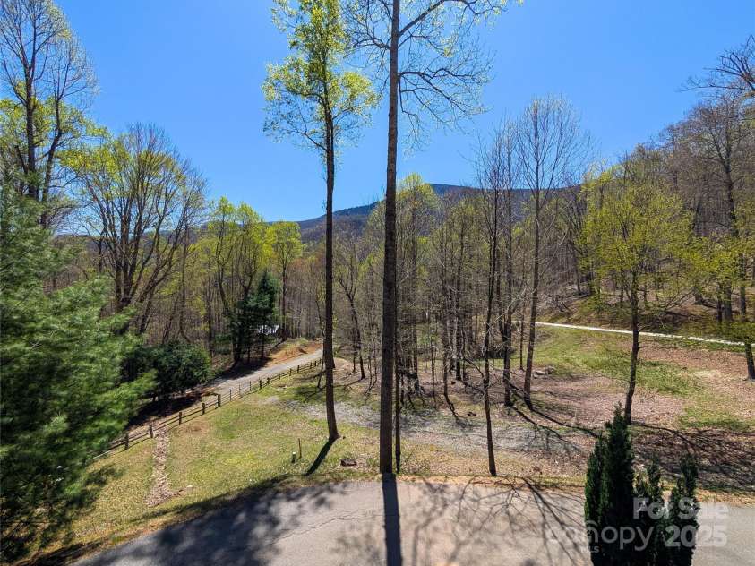 13 Miners Trace Road, Burnsville, NC 28714.  MLS# CAR4206928, YatesRealty ID 13994. Early spring gorgeous mountain views and view of additional lot conveyed