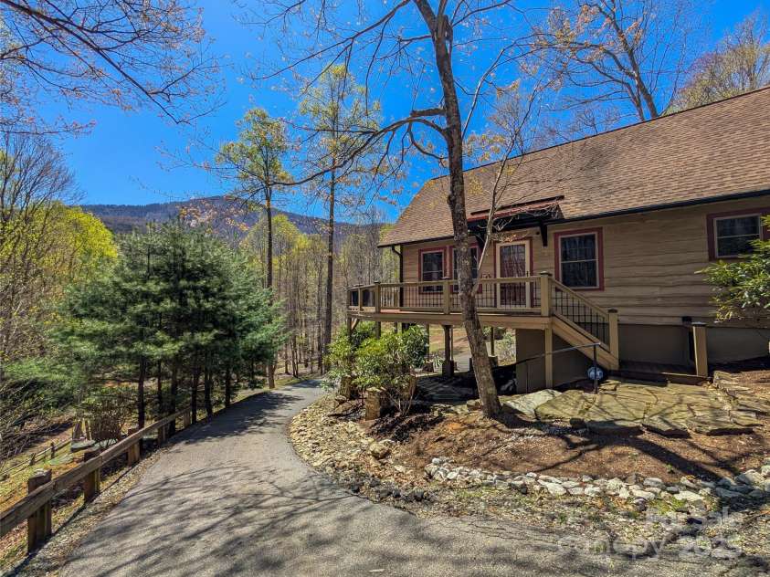 13 Miners Trace Road, Burnsville, NC 28714.  MLS# CAR4206928, YatesRealty ID 13994. Early spring view of property and beautiful mountain views!