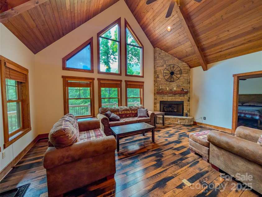 13 Miners Trace Road, Burnsville, NC 28714.  MLS# CAR4206928, YatesRealty ID 13994. From the moment you step inside, you're enveloped in the warmth & charm of mountain living, where no expense has been spared.