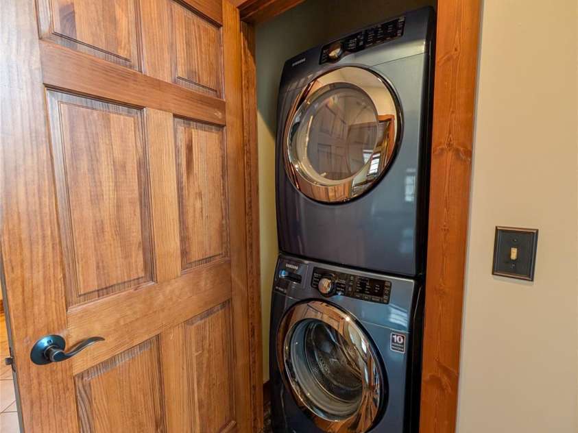 13 Miners Trace Road, Burnsville, NC 28714.  MLS# CAR4206928, YatesRealty ID 13994. Stack washer and dryer located in hallway on main level
