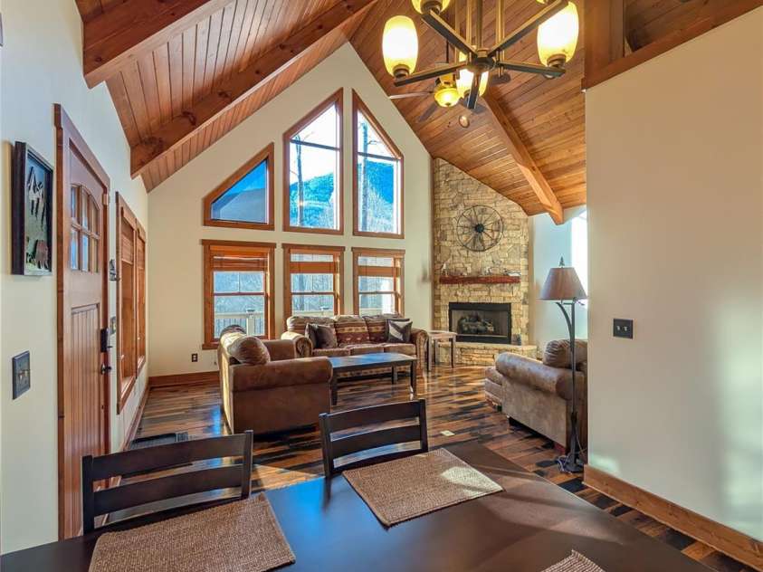 13 Miners Trace Road, Burnsville, NC 28714.  MLS# CAR4206928, YatesRealty ID 13994. View of dining area & Great Room from Kitchen.