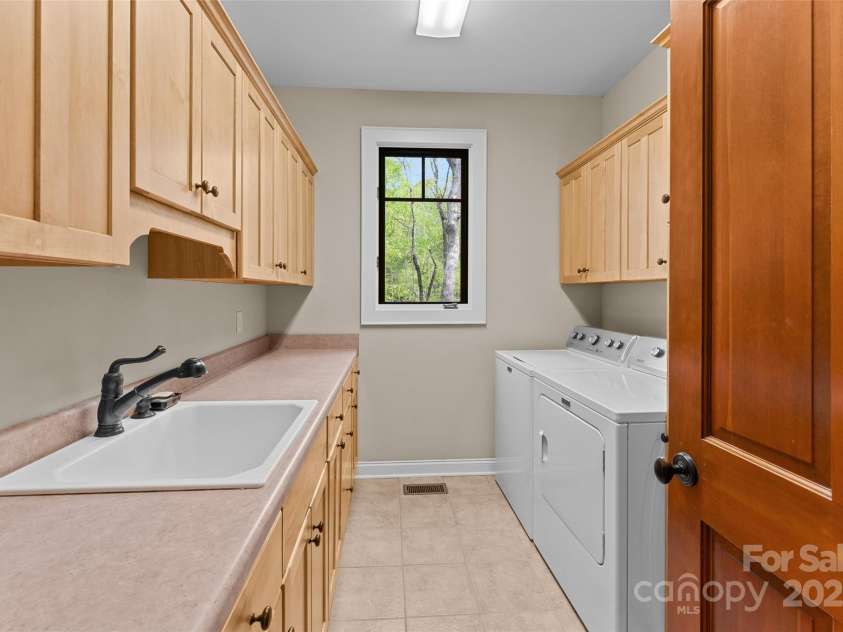 405 Kanasdatsi Drive, Brevard, NC 28712.  MLS# CAR4255040, YatesRealty ID 13995. 