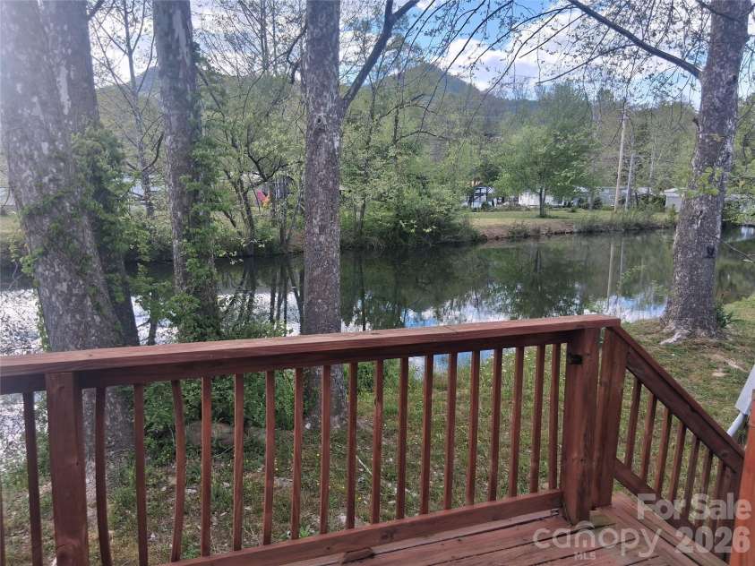 124 Pike Point, Waynesville, NC 28785.  MLS# CAR4371521, YatesRealty ID 13996. Another view of the pond