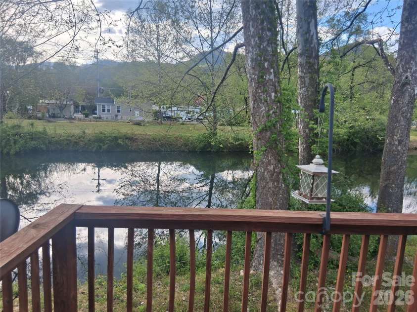 124 Pike Point, Waynesville, NC 28785.  MLS# CAR4371521, YatesRealty ID 13996. Pond right behind the home