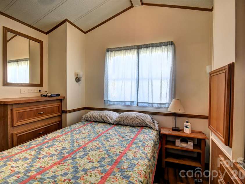 124 Pike Point, Waynesville, NC 28785.  MLS# CAR4371521, YatesRealty ID 13996. Rear Bedroom with built-ins