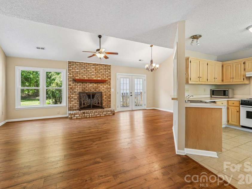 15032 Catawba Circle, Matthews, NC 28104.  MLS# CAR4369229, YatesRealty ID 13997. Open living space
