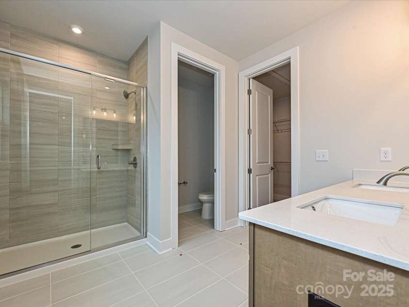 223 Halemarg Drive, Belmont, NC 28012.  MLS# CAR4269526, YatesRealty ID 13999. En suite spa-inspired primary bath.
