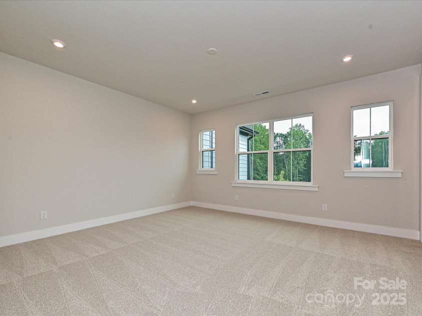 223 Halemarg Drive, Belmont, NC 28012.  MLS# CAR4269526, YatesRealty ID 13999. Large primary suite with bright and open windows.