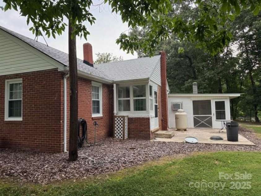 180 Tower Road, Troy, NC 27371.  MLS# CAR4275578, YatesRealty ID 1400. Back View