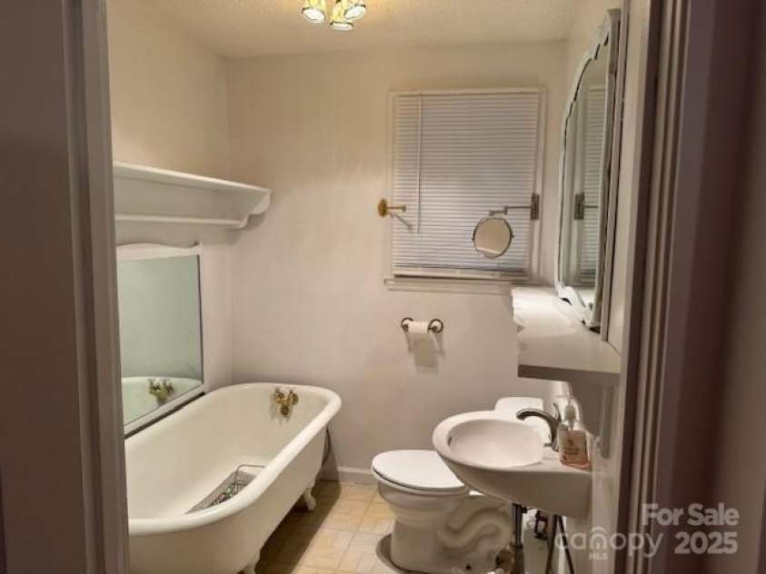 180 Tower Road, Troy, NC 27371.  MLS# CAR4275578, YatesRealty ID 1400. Bath