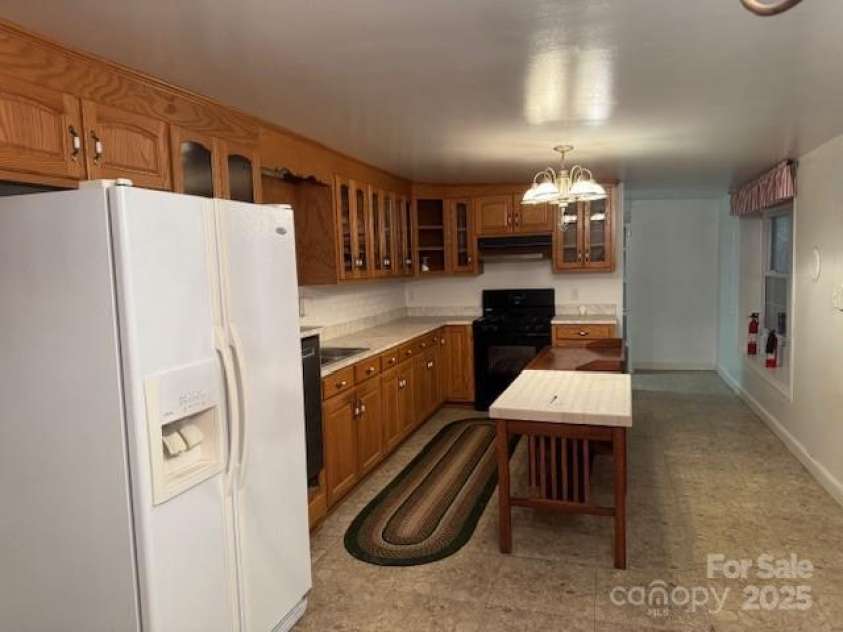 180 Tower Road, Troy, NC 27371.  MLS# CAR4275578, YatesRealty ID 1400. Kitchen