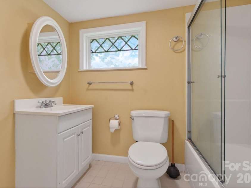 95 Whitney Avenue, Tryon, NC 28782.  MLS# CAR4354640, YatesRealty ID 14002. Basement bathroom