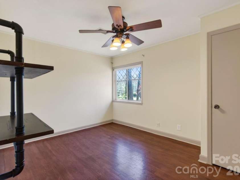 95 Whitney Avenue, Tryon, NC 28782.  MLS# CAR4354640, YatesRealty ID 14002. Bedroom 2