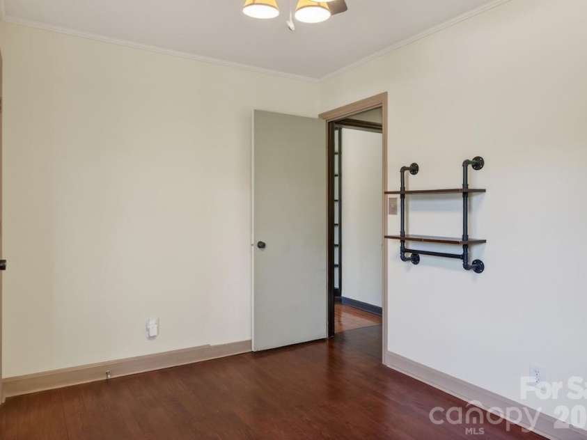 95 Whitney Avenue, Tryon, NC 28782.  MLS# CAR4354640, YatesRealty ID 14002. Bedroom 2