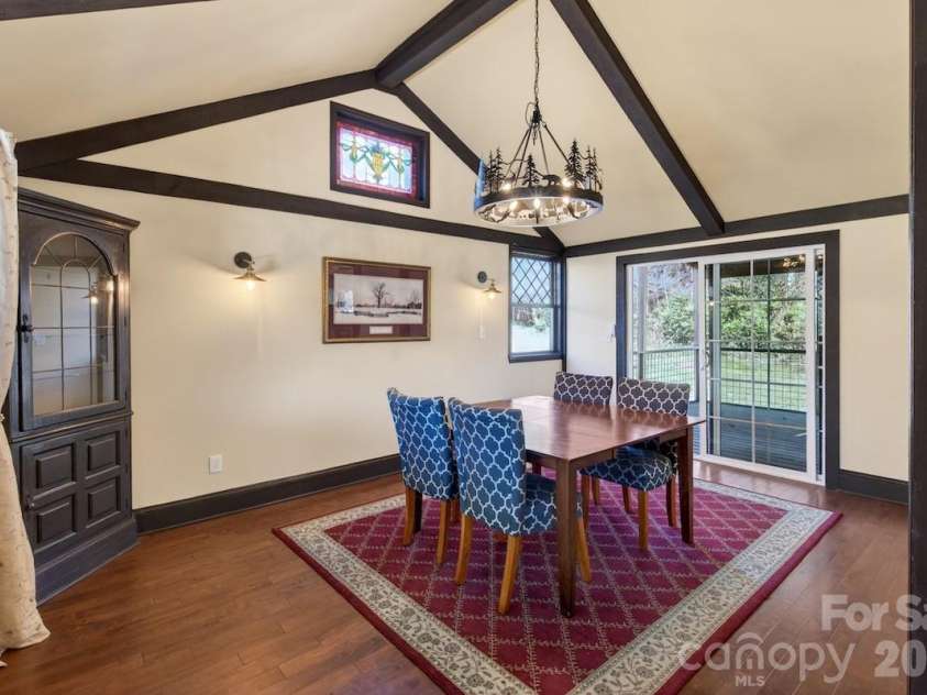 95 Whitney Avenue, Tryon, NC 28782.  MLS# CAR4354640, YatesRealty ID 14002. Dining room with exposed beams