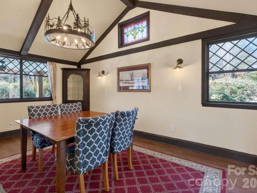 95 Whitney Avenue, Tryon, NC 28782.  MLS# CAR4354640, YatesRealty ID 14002. Dining room with stained glass window