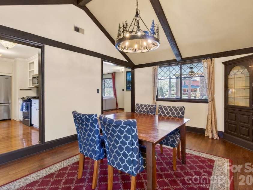 95 Whitney Avenue, Tryon, NC 28782.  MLS# CAR4354640, YatesRealty ID 14002. Dining room with vaulted ceilings