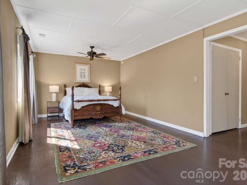 95 Whitney Avenue, Tryon, NC 28782.  MLS# CAR4354640, YatesRealty ID 14002. Large Primary Bedroom